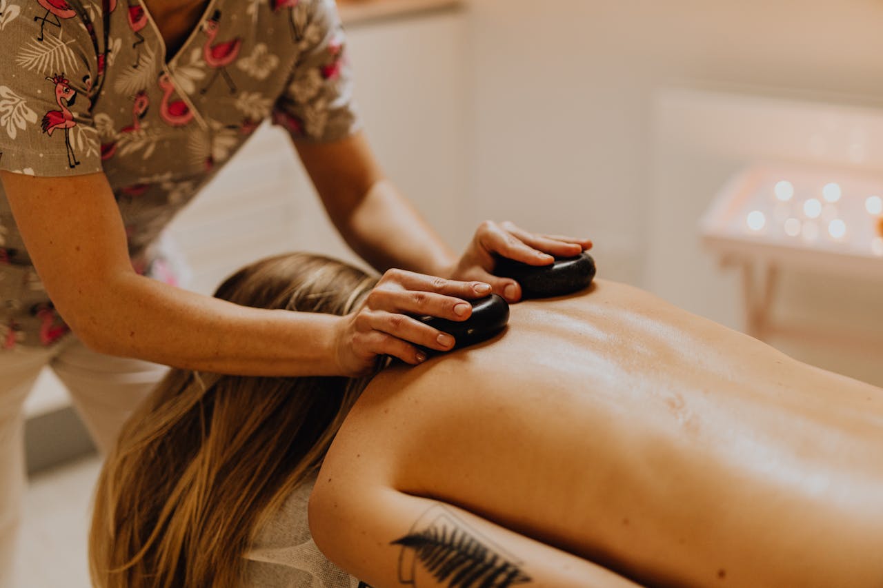 Hot stone massage during a relaxing Manhattan body rub